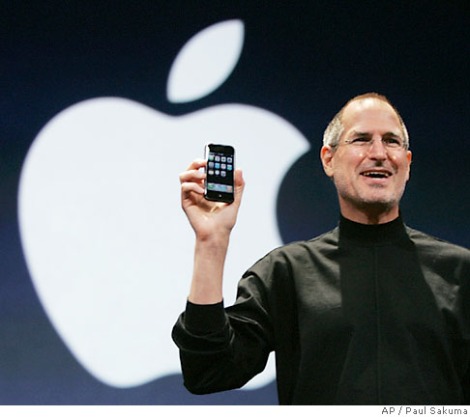 CEO of Apple, Steve Jobs showing the iPhone